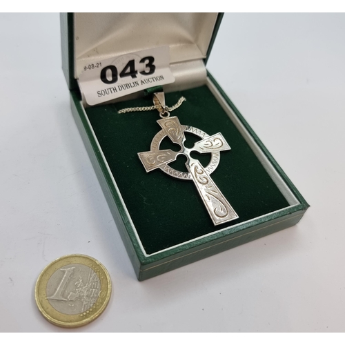 43 - An attractive sterling silver Celtic cross pendant and chain. Length of chain 60cm, weight of silver... 