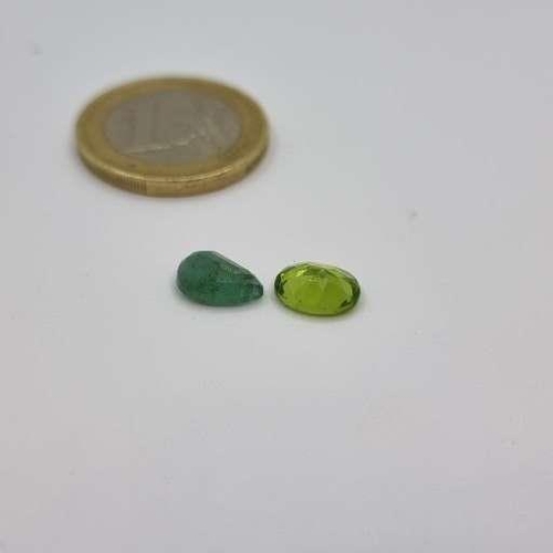 717 - Two precious gemstones, 1.45 tear drop Emerald and 1.7cts very vivid green peridot. Both Lovely ston... 