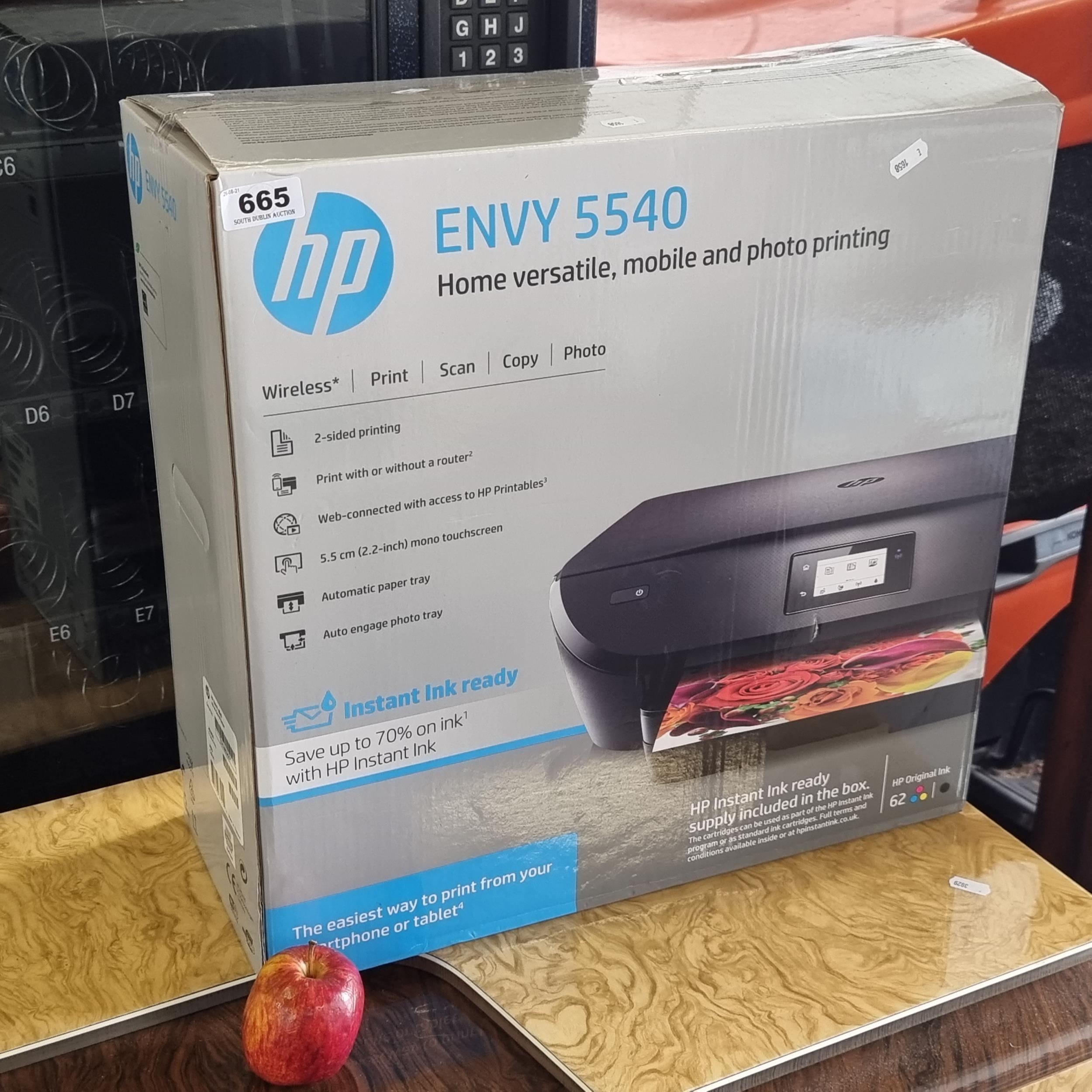 Envy 5540 All-in-One Printer in box, never according to vendor.