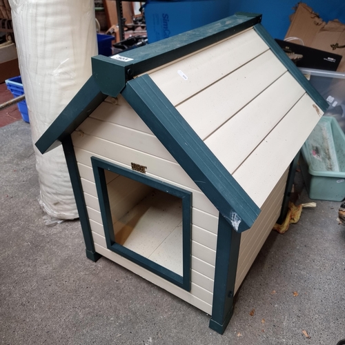 303 - Charming Ecoflex small dog house in cream and teal. Door Mm: 65 cm x 56 cm x 61 cm. As new.