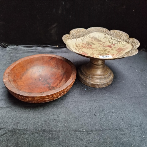 322 - A carved wooden bowl and a worked metal cakestand.