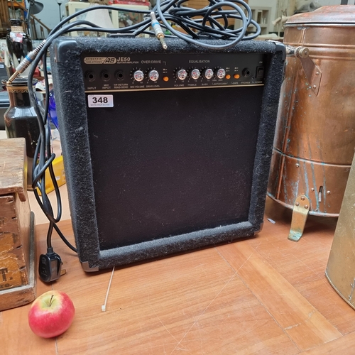 348 - An Acoustic Solutions good size Guitar Amplifier JE50. With cords included.