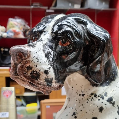 354 - STAR LOT - A very large, rare, 19th century black and white ceramic dog. A Victorian ''Talking-Piece... 