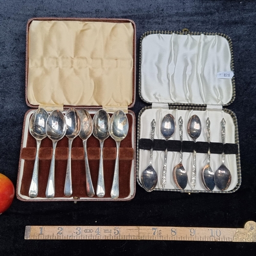 143 - Two sets of 6 EPNS teaspoons in original presentation boxes; including one set of apostle spoons.