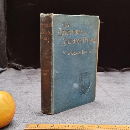 156 - An antique copy of 'The Adventures of Sherlock Holmes' by A. Conan Doyle, published in 1895.