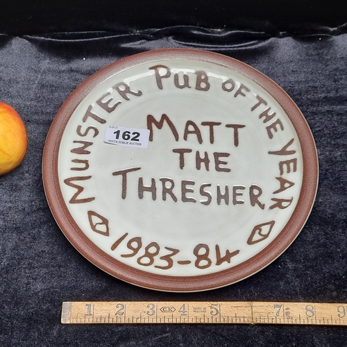 162 - A Munster Pub of the year terracotta plate, awarded to Matt The Thresher 1983-1984. Made by Stephen ... 