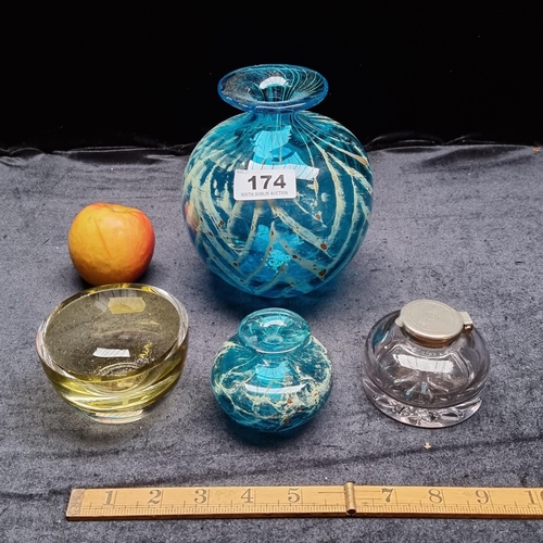 174 - Four glass items, including an inkwell and a Kenneth Turner yellow hued bowl and two heavy art glass... 