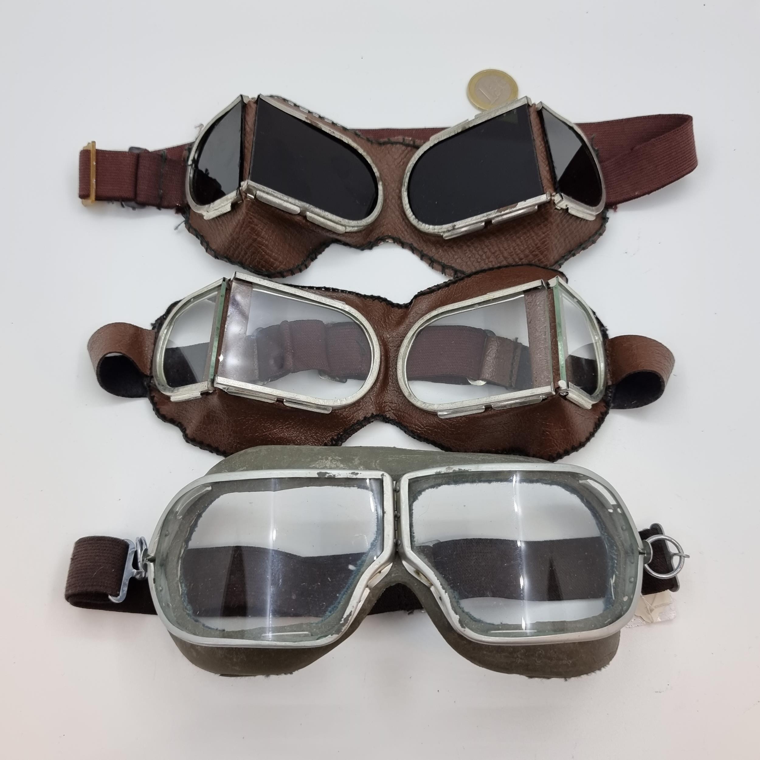 Three pairs of Vintage Soviet Goggles inc Tank goggles and two pairs of wrap around googles one pair