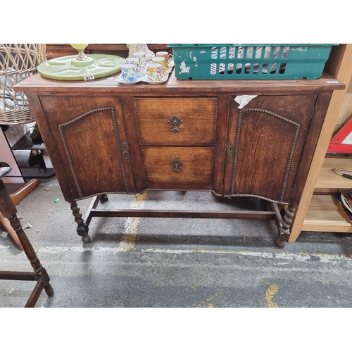 811 - Beautiful vintage 1930a pedestal sideboard with carved bead detailing, turned legs, 2 drawers and 2 ... 