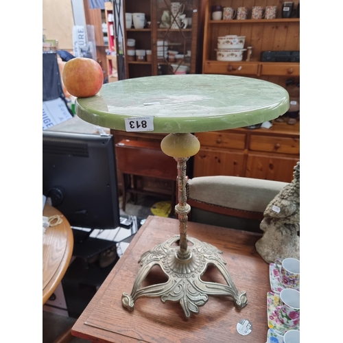 813 - Mid Century Marble effect wine table on decorative brass base.