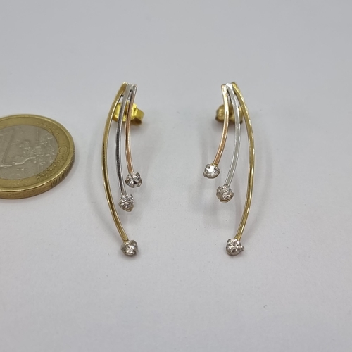 18 - Star Lot : A very attractive pair of 9 carat tri color gold drop stud earrings.