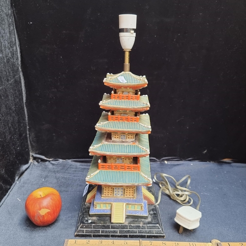 240 - A very heavy, vintage, ceramic lamp in the form of a Pagoda. This is a truly lovely item with striki... 