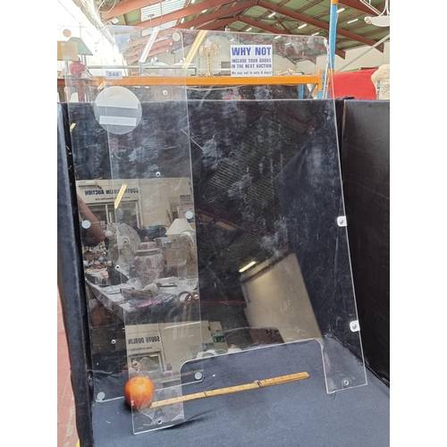 248 - Two large Perspex screens, One cut out in the shape of a counter with cash slot Mm: 65 cm x 100 cm. ... 