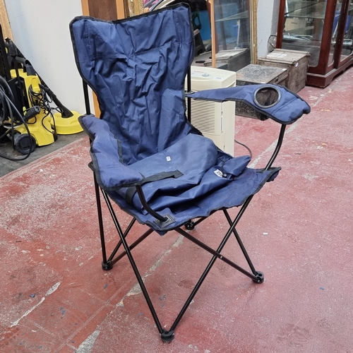 259 - A collapsible navy camping chair on a metal frame, in travel bag. This chair has built-in cupholders... 