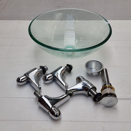 268 - A glass wash basin, four chrome taps and 'click clack' stopper.