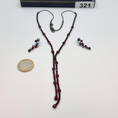 321 - A garnet stone necklace, together with matching pair of drop stud earrings. Length of necklace 52cm.