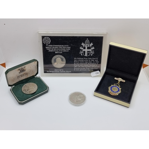 325 - An interesting collection of four items consisting of a past President Master Baker medal, hallmarke... 