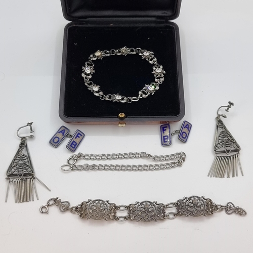 35 - A collection of five sterling silver jewellery items, consisting of three bracelets, an attractive p... 