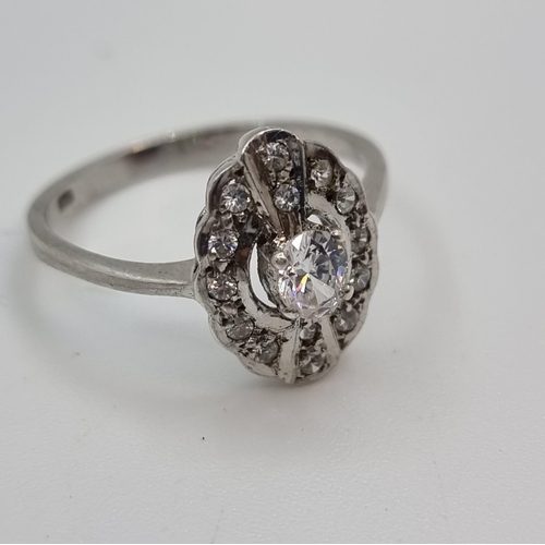 358 - A very attractive art deco style  sterling silver (stamped 925) oval gemset ring, with gemset centre... 