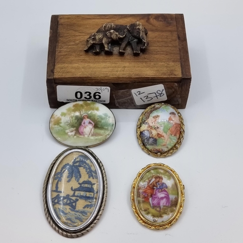 36 - A collection of four pictorial brooches, one a Limoges example. All pins in working order. Items con... 