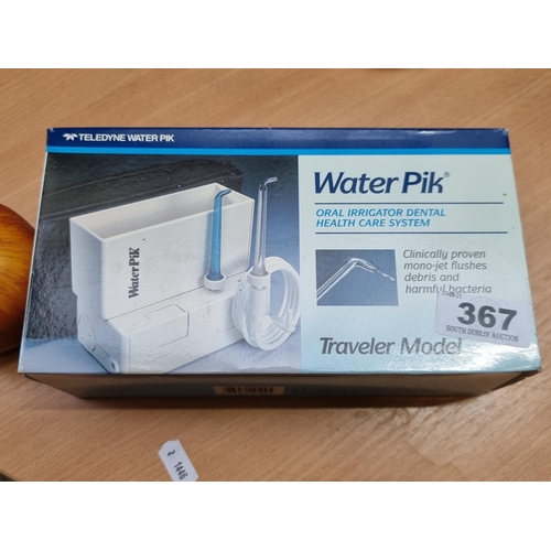 367 - Teledyne waterpik, oral irrigater dental health care system, travel model. Expensive new