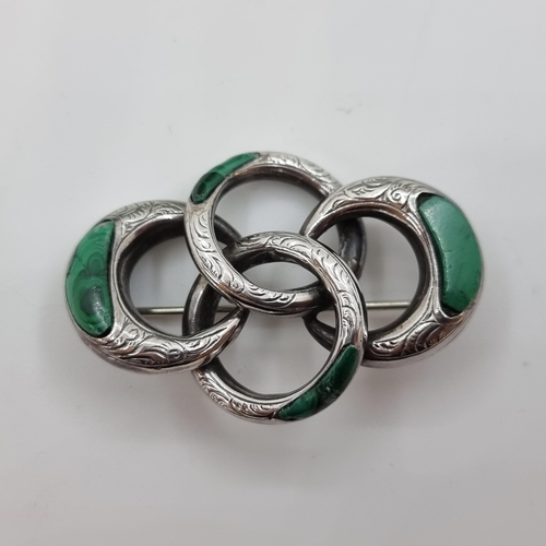 4 - A very attractive Antique  Irish sterling silver ring brooch with jade stone setting. Weight of piec... 
