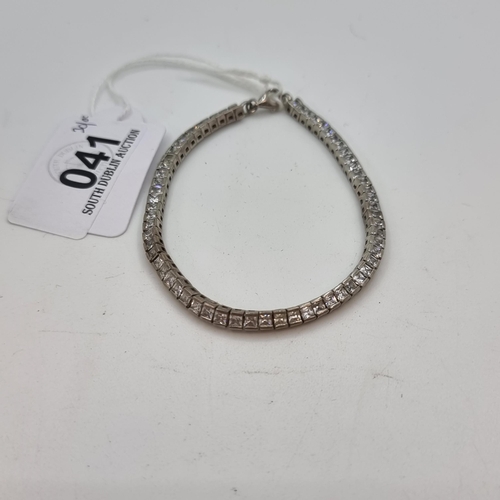 41 - A sterling silver (stamped 925) gemstone line bracelet. Length of bracelet 17cm.