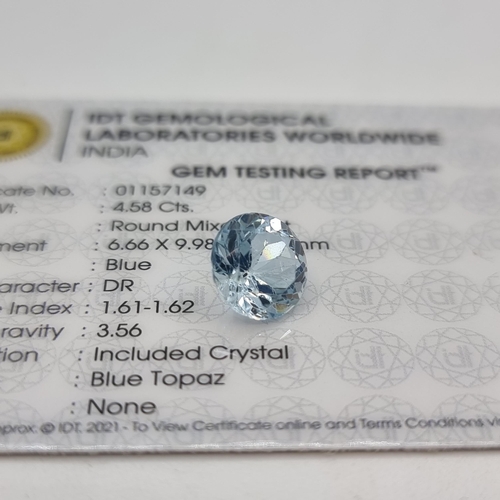 45 - A very bright blue topaz round step cut stone, of 4.58 carats. Comes with gem certificate. Lovely st... 