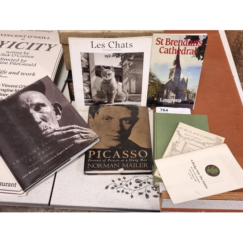 764 - Some interesting books and ephemera including a hardback copy of ''The Celtic Dawn'' by Ulick O'Conn... 