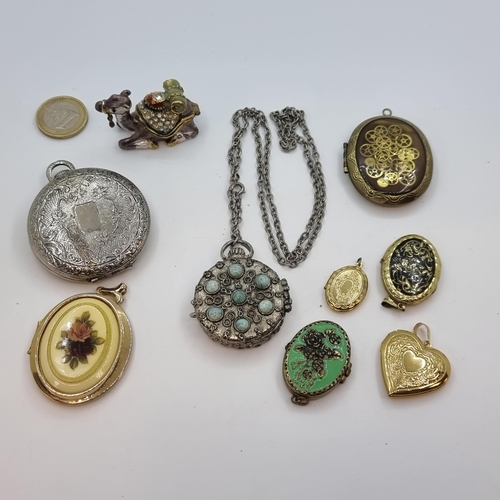 8 - A collection of nine vintage lockets, together with an interesting gemset camel pendant.