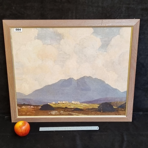 84 - Large print of a Paul Henry painting, showing his signature clouds, mountains and thatched cottages.