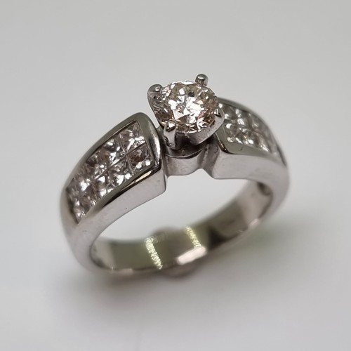 1 - Star Lot: Fabulous 18 carat white gold diamond ring. Features a one solitaire diamond (one full cara... 