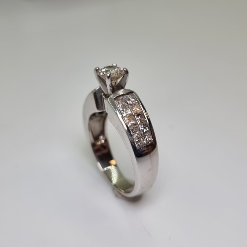 1 - Star Lot: Fabulous 18 carat white gold diamond ring. Features a one solitaire diamond (one full cara... 
