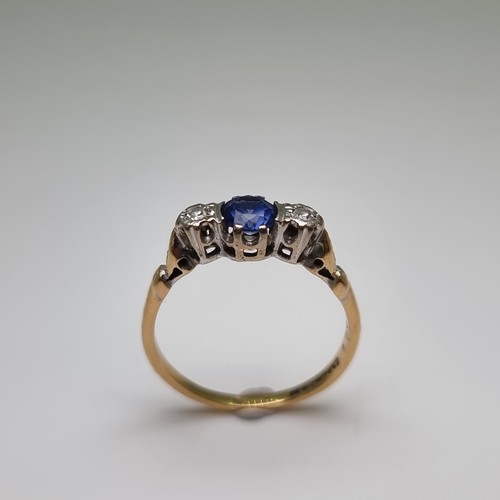 3 - Star Lot : A pretty 9 carat gold ring with a bright Tanzanite stone, together with two diamonds. Wei... 