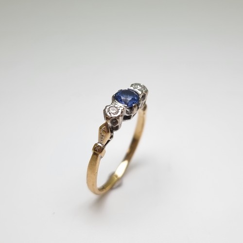 3 - Star Lot : A pretty 9 carat gold ring with a bright Tanzanite stone, together with two diamonds. Wei... 