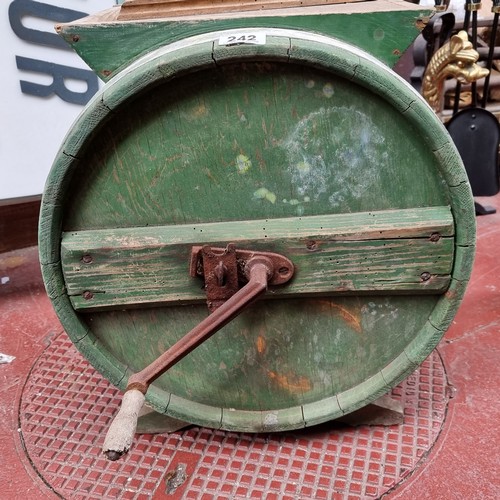 242 - A large, vintage wooden table-top butter churn. With cast-metal hand crank and lid.