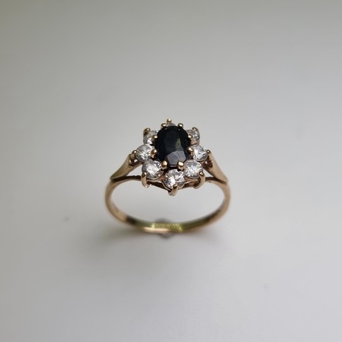 323 - Hallmarked 9 carat gold  Sapphire ring . Weight of ring 2g, size P 1/2.