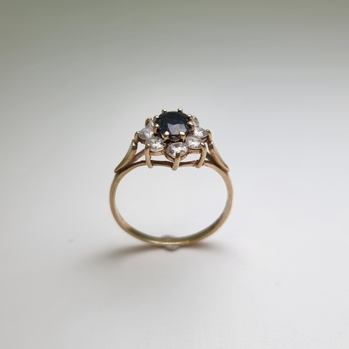 323 - Hallmarked 9 carat gold  Sapphire ring . Weight of ring 2g, size P 1/2.