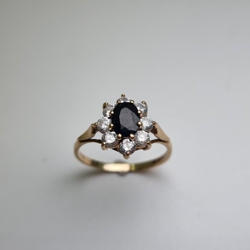 323 - Hallmarked 9 carat gold  Sapphire ring . Weight of ring 2g, size P 1/2.