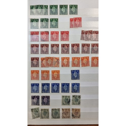 337 - A large, fully furnished stamp album, containing some high valued sets from the UK and Ireland. Toge... 