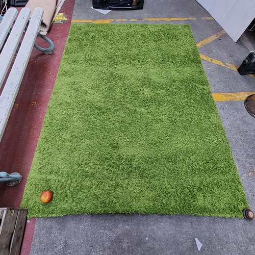 A green HAMPEN floor rug from Ikea. 160cm X 230cm. From the