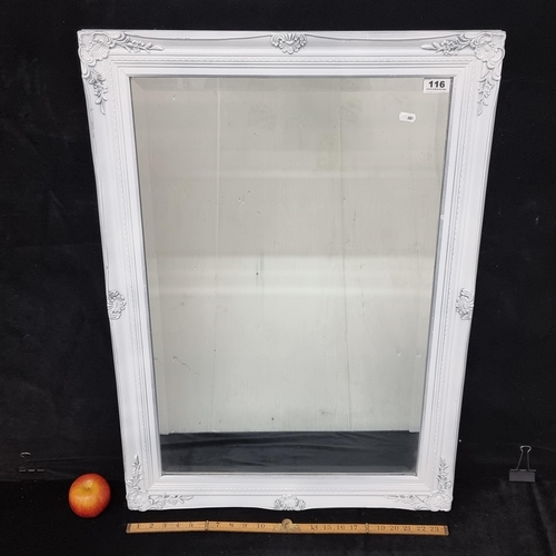 116 - Large contemporary bevelled mirror with an intricate white frame.