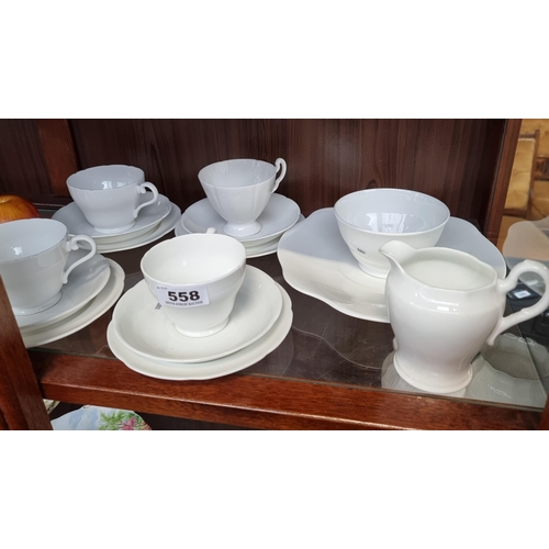 558 - 15 pieces of elegant white china including some pieces from Ainsley.