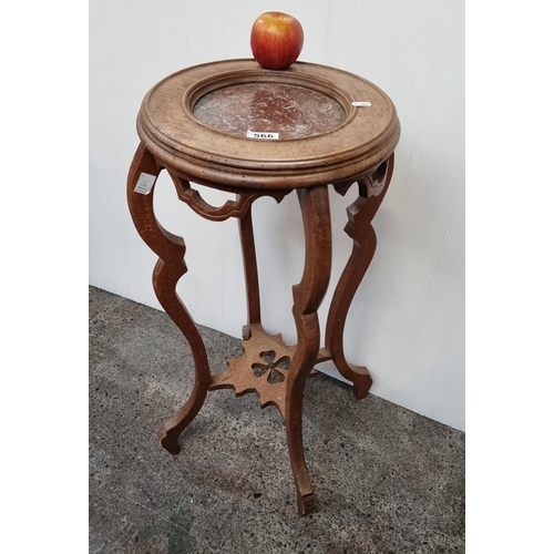 566 - A super gothic style wood and marble plant stand with elaborate carving, cabriole legs and clover de... 