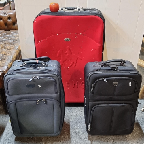585 - Three suitcases including a large Polongo case with wheels with built in combination lock, measuring... 