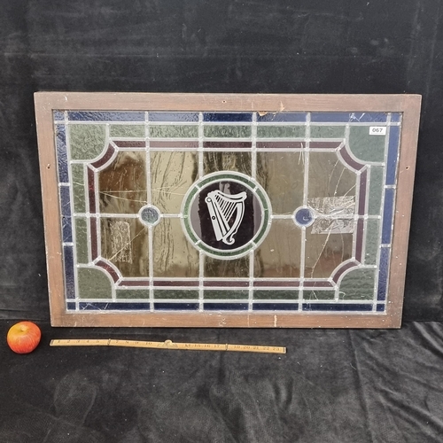 67 - Large stained glass window frame, with a central rosette showing an Irish harp. Mm: 92 cm x 61 cm. D... 