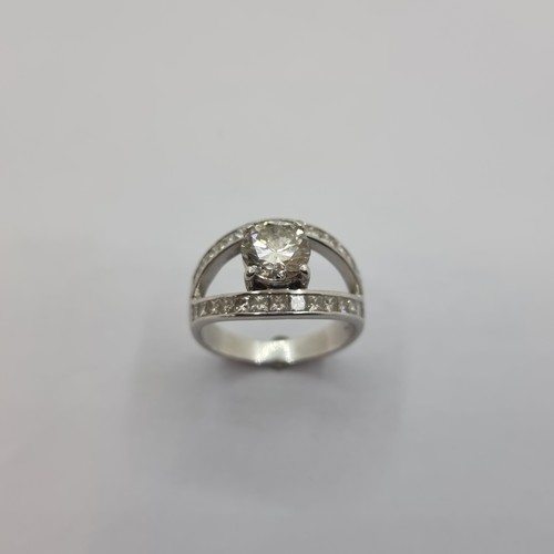 3 - Star Lot: A very fine 18K white gold solitaire ring. With central diamond of 1.6 carats, with diamon... 