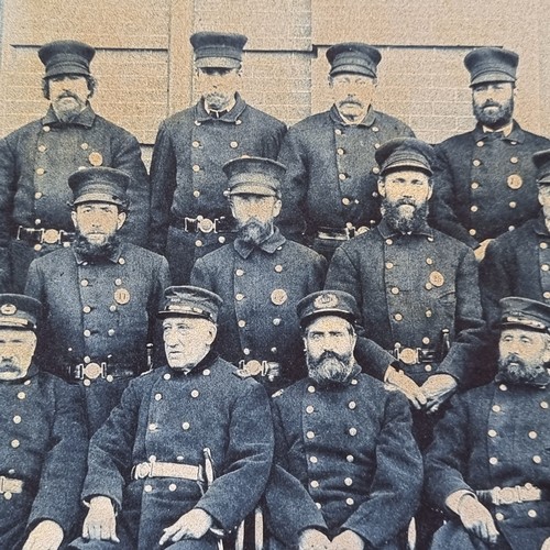 86 - Print of an antique photograph depicting men in uniform with a wonderful range of beards and moustac... 