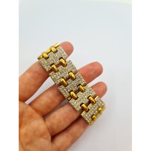 56 - A nice example of a designer Art Deco bracelet with gold metal links and marcasite setting, marked V... 