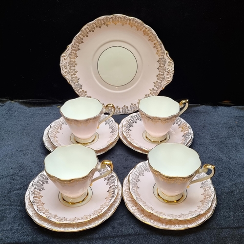 102 - 13 piece vintage Royal Standard Bone China part tea set, including four cups, four saucers and four ... 